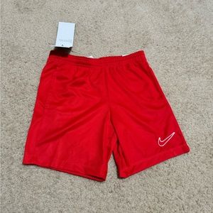 Red standard fit nike shorts